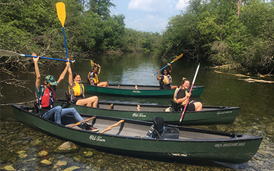 Students in a canoe ready to take off
